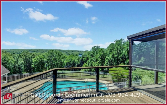 Live in this stunning Haddam CT waterfront home with a pool - set in a breathtaking backdrop of lush greens and the glorious Connecticut River.